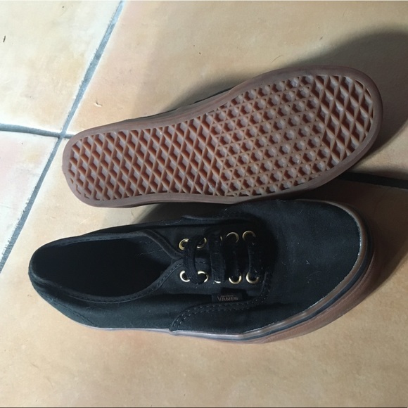black vans tan bottom